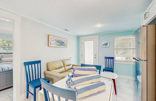 Holmes Beach Villa | Quaint beachfront duplex villa in ideal location with screened lanai & free trolley