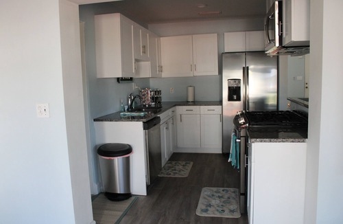 Bayshore Gardens House | Relaxing Waterfront Home with quick access to Golf, Beaches & Shopping