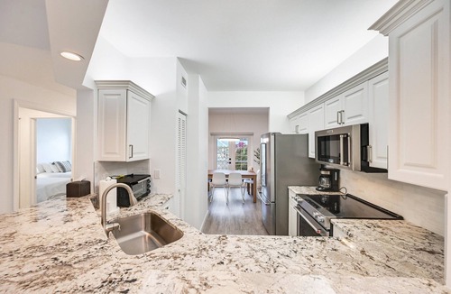 Pelican Bay Condo | Renovated 2BR in Pelican Bay - Private Beach Access & Amenities