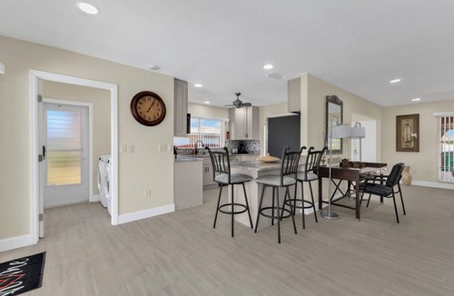 Edgewater House | Renovated house with huge screened and heated pool and canal on Charlotte Harbor