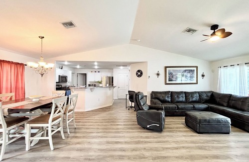Harris House | Salt water, screened-in heated pool house and lanai