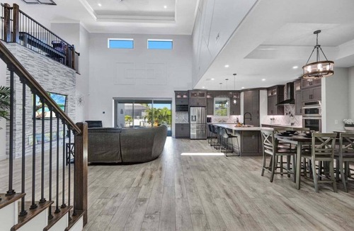 Fort Myers Villa | Saltwater Playhouse 1005 Luxury Pool & Spa Home w/Game Loft and Gulf Access Only Minutes Away