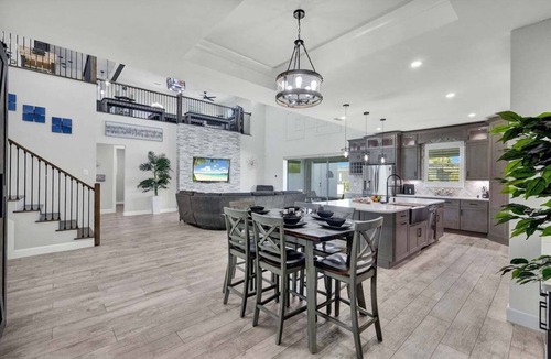 Fort Myers Villa | Saltwater Playhouse 1005 Luxury Pool & Spa Home w/Game Loft and Gulf Access Only Minutes Away