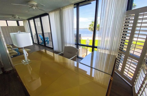 Punta Rassa Condo | Sanibel Harbour Resort: Bay View Tower 137 Waterfront condo with private beach