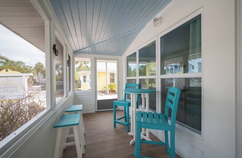 Anna Maria House | Sassy Seagull -Classic beach cottage, moments from the sand, beautiful pool!