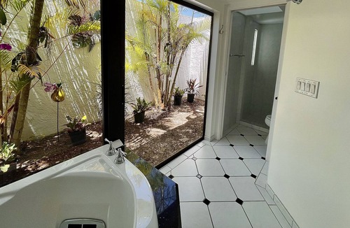 Vanderbilt Beach House | Serenity on the Sea-Luxurious water front sunny south facing home w/heated pool!