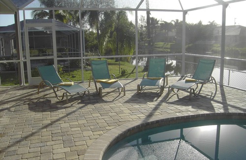 Cape Coral Villa | Southern exposure Canal Home with heated Pool - electric or solar !