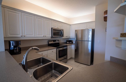 Pelican Bay Condo | Spacious 3-bedroom condo minutes from beach with access to resort-like amenities