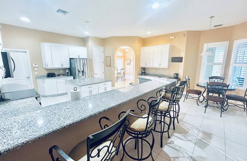 Yacht Club House | Spacious 4 bed 3 bath heated pool home with hot tub in prime Cape Coral location