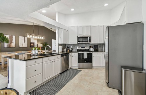 Palm Harbor House | Spacious 4-bedroom house with HEATED POOL, Games room in peaceful Palm Harbor
