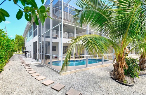 Bonita Springs House | Steps from Bonita Beach! Great family home with a pool on salt water canal!