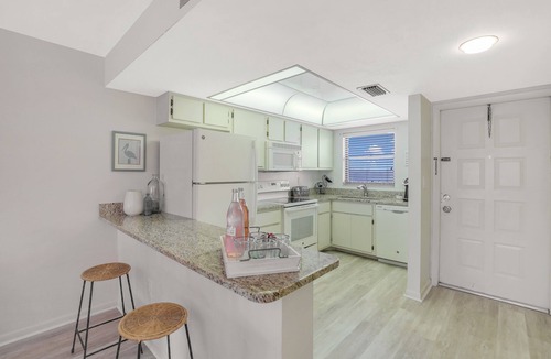 Vanderbilt Beach Condo | Steps to Vanderbilt Beach!