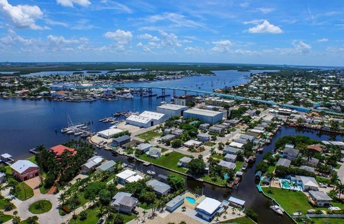 Mid Island House | Strandview #304 - Beachfront condo with screened-in patio and amazing view!