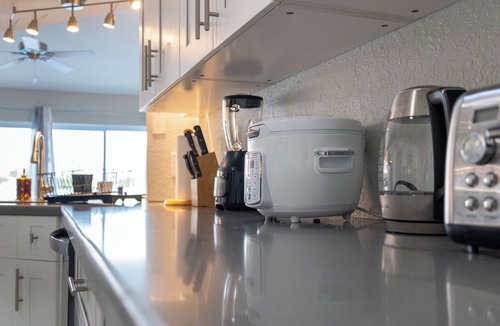 Bonita Springs House | Stunning Lakefront Solar Heated Pool & Spa House! Close to the Beach!