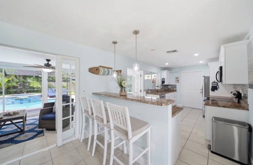 Naples Park House | Stylish Naples Retreat Heated Pool + Spa Minutes to Beach