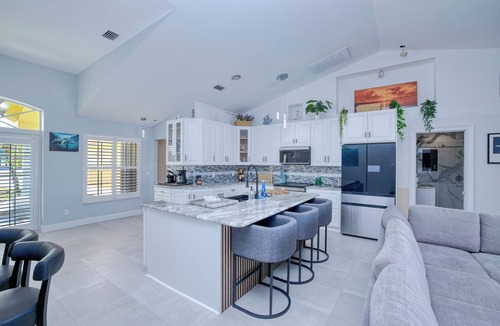 Burnt Store House | Summer discount! Family Oasis-Heated pool and hot tub. Wide canal & manatees
