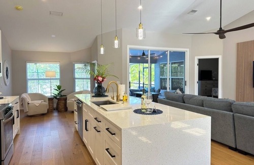 Venice Gardens House | SunCoast Garden Family Retreat-Beautiful Vacation Home with Heated Pool.