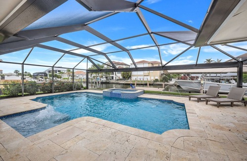 Connors House | Sunsations | Waterfront Home with Private Dock | Saltwater Pool & Spa