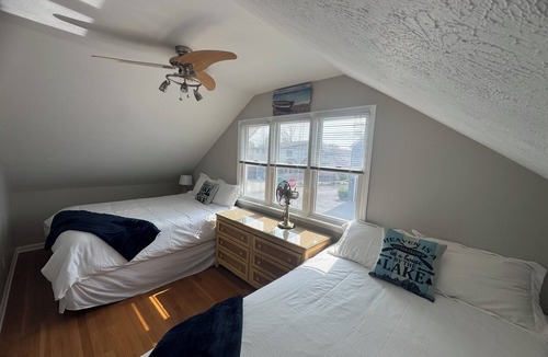 Russells Point House | SUNSET LOFT Waterfront retreat, boat lift, water toys, best sunsets on the lake!