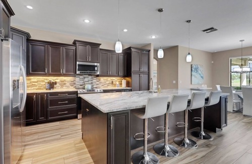 Burnt Store Villa | Tee Times and Tan Lines 1006 4 BR Heated Pool & Spa Retreat on Coral Oaks Golf Course