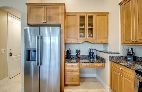 Fort Myers Villa | The Grand Colonnade - Ample 3 BR/3 bath waterfront Villa with 2 suites, heated pool, kayaks, pool table, fishing poles