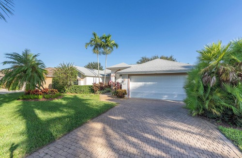 Central Naples Villa | The Terrazzo Home – Breezy Coastal Style Pool Retreat in Quiet Briarwood, Naples