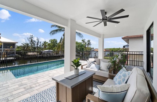Bonita Springs House | Tranquil Bayfront Oasis – Dock, Heated Pool, Fire Pit + 5 Min to Beach