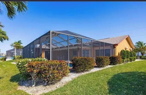 Eight Lakes House | Tropical Paradise with gulf access and heated pool