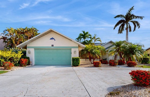 Eight Lakes House | Villa Aasta | Luxe Lakefront Outdoor Living | Screened Pool, Game Room & Dock