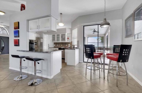 Cape Coral House | Villa Aurora 1017:Heated Pool Canal View Vacation Rental SE Cape Coral