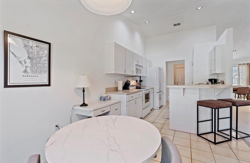 Arlington Park House | Waldemere House | Saltwater Pool | Screened Porch, Fireplace + Games