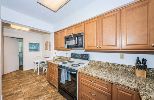 Isla del Sol Condo | Waterfront 2BR/2BA condo with pool, hot tub, beach access, and water views.