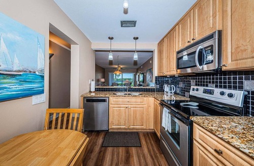 Isla del Sol Villa | Waterfront 2BR/2BA condo in St. Petersburg with pool, hot tub, and balcony.