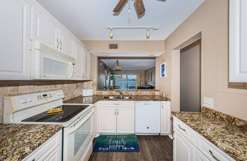 Isla del Sol Villa | Waterfront 2BR/2BA condo with pool, hot tub, balcony, and Wi-Fi.