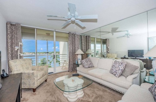 St. Petersburg Condo | Waterfront 2BR condo in St. Petersburg with balcony, pool, and water views.