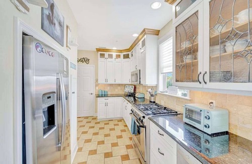 Matlacha House | Waterfront home with private pool, dock, patio, balconies, & bikes