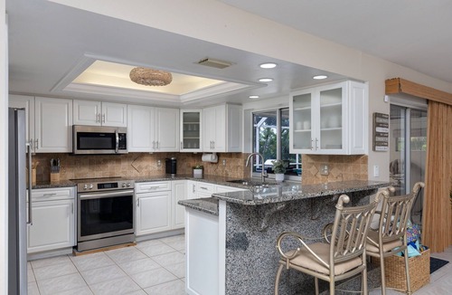 Burnt Store House | Waterfront Oasis - Fish from Backyard, Heated Pool & Spa