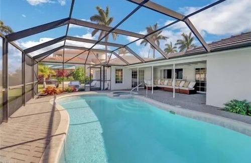 Coquina Sands House | Waterfront paradise walking distance to the beach & minutes to downtown Naples!