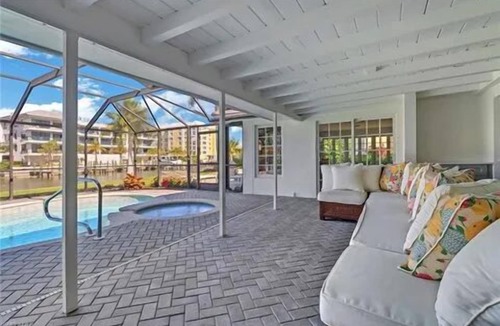 Coquina Sands House | Waterfront paradise walking distance to the beach & minutes to downtown Naples!