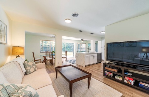 Coquina Sands House | West of 41. Walk 6 minutes to the Lowdermilk beach, theatre, mall and grocery.