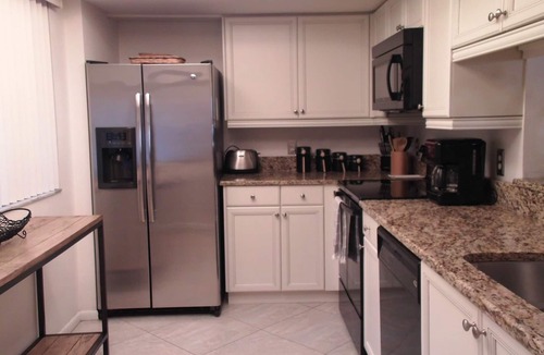 Bonita Bay Condo | Wild Pines corner unit. Beautiful weather, golfing, and beaches.