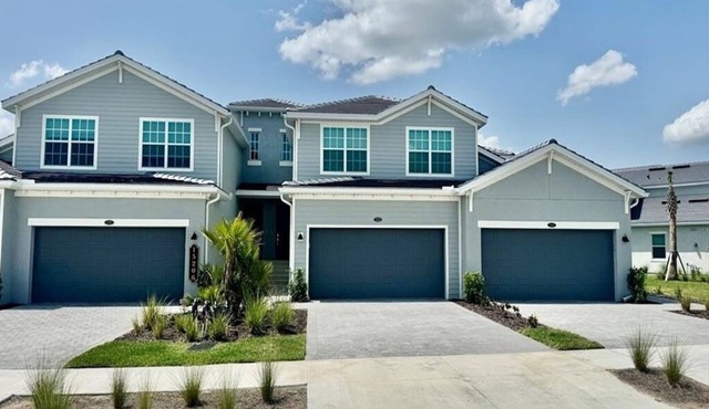 Centrally-located coach home.