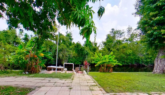 Charming waterfront home with firepit, central AC, W/D, & dog-friendly