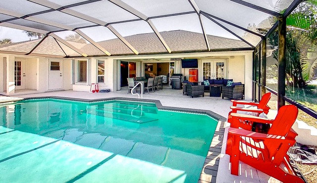 Dog-friendly canal view retreat with a private pool, A/C, & washer/dryer
