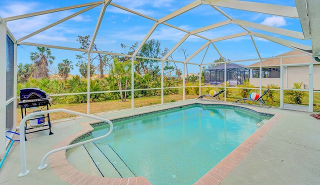 Dog-friendly single-story home with heated private pool, lanai, firepit & golf