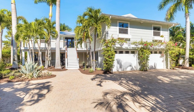 Enjoy luxury at Waterfront 165 1st Street in Boca Grande, a 4-bedroom retreat with canal views.
