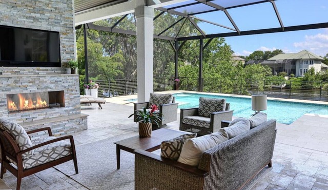 Gorgeous Riverfront Retreat | 5-min to Beach + Elevated Pool