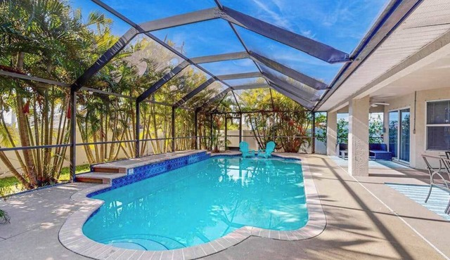 Luxury coastal retreat with office, lanai, pool, alfresco dining & tiki bar