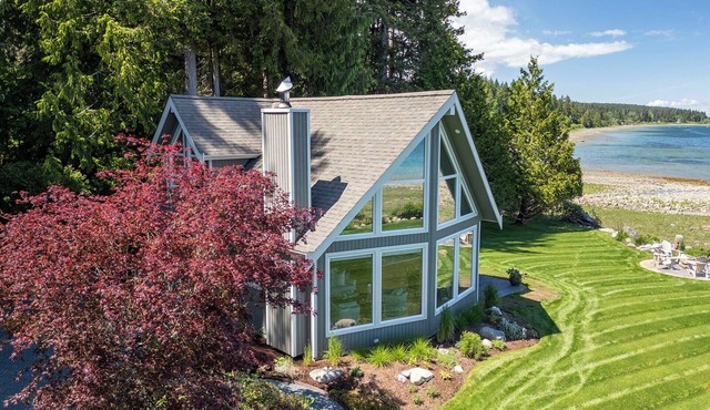 Open Design West Coast Home on 1600 Feet of Private Waterfront in Union Bay