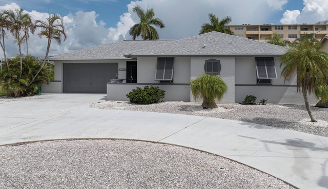Pink Pineapple ~ Walk to Downtown ~ Chic Heated Pool Home